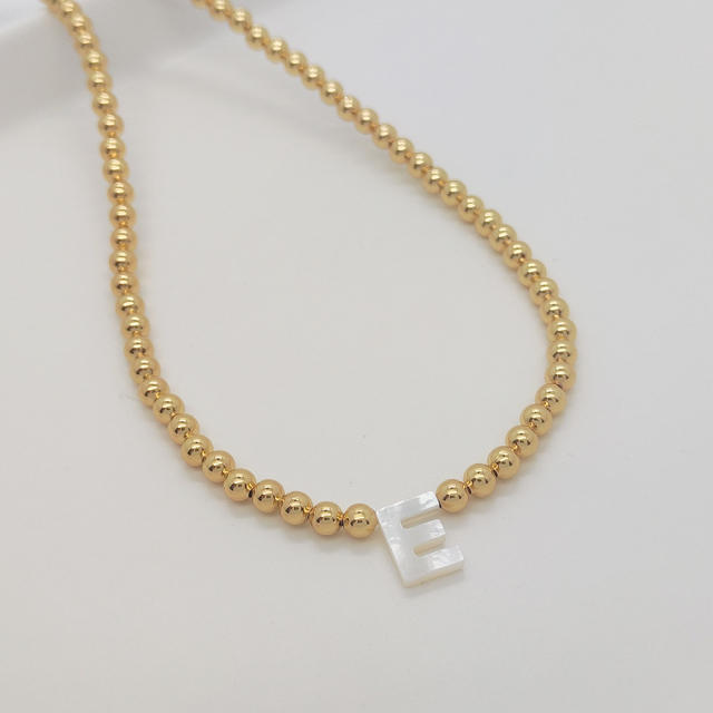 Natural shell initial letter gold plated copper beaded necklace