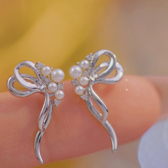 Sweet pearl cubic zircon setting silver bow studs earrings