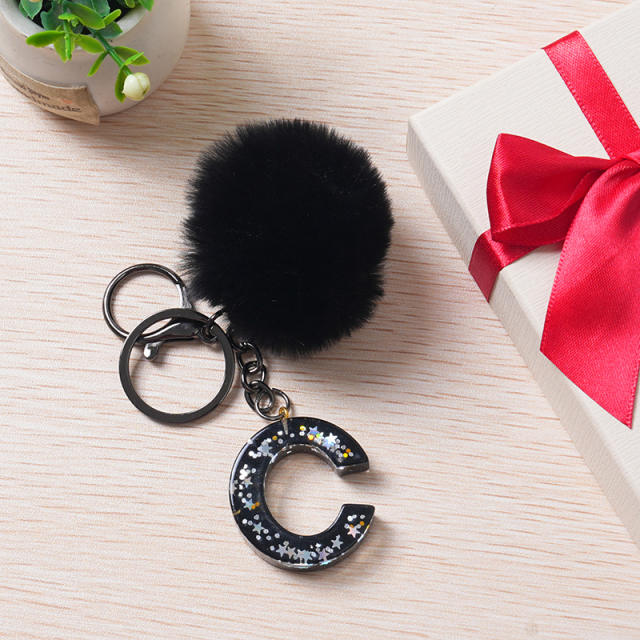 Black color fluffy ball initial letter keychain