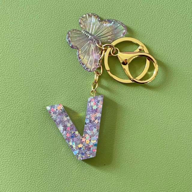 Purple color butterfly initial letter keychain