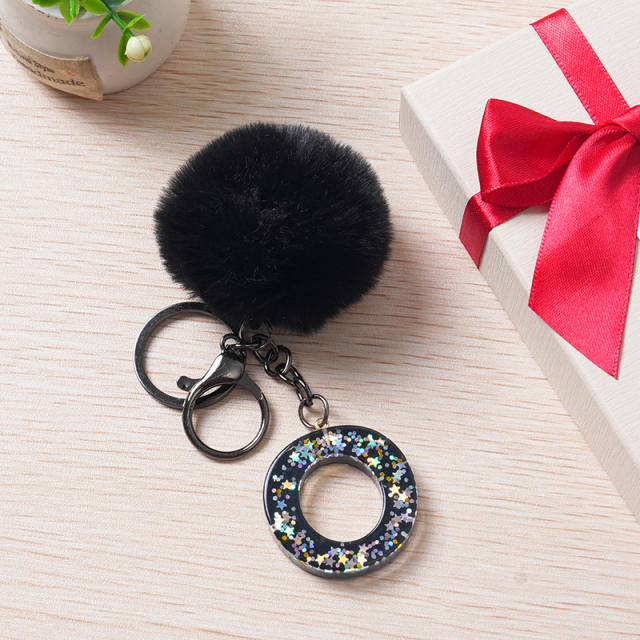 Black color fluffy ball initial letter keychain