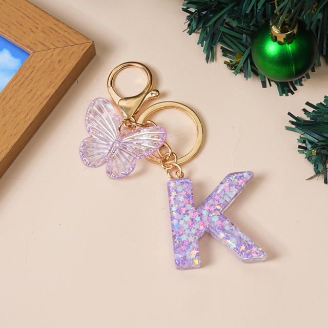 Purple color butterfly initial letter keychain