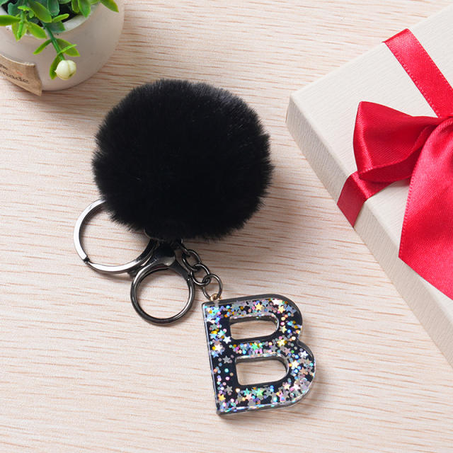 Black color fluffy ball initial letter keychain