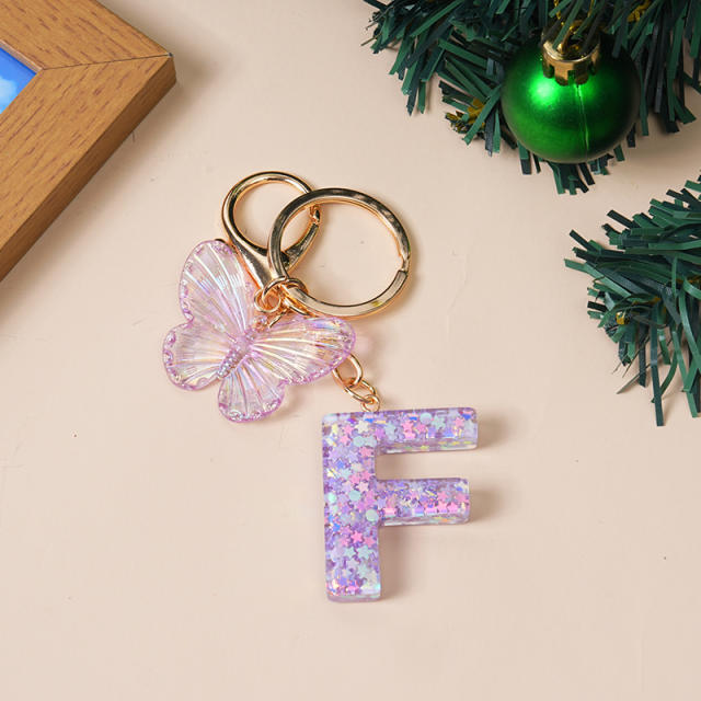 Purple color butterfly initial letter keychain