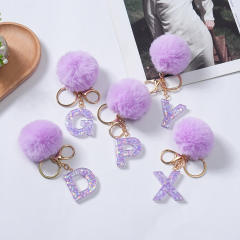Cute purple color fluffy ball initial letter keychain