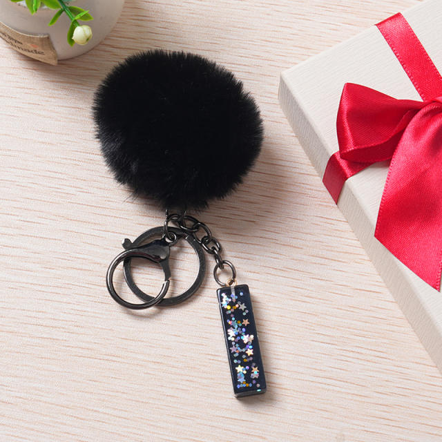 Black color fluffy ball initial letter keychain