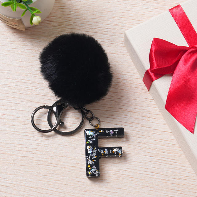 Black color fluffy ball initial letter keychain