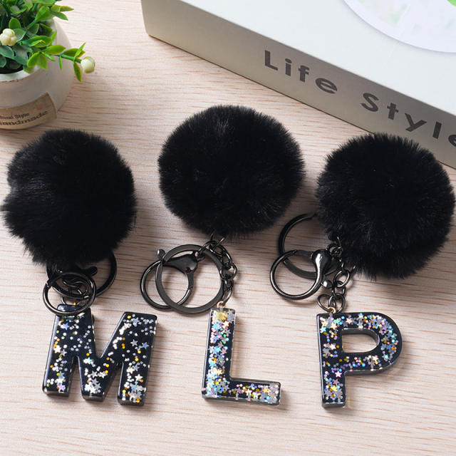 Black color fluffy ball initial letter keychain