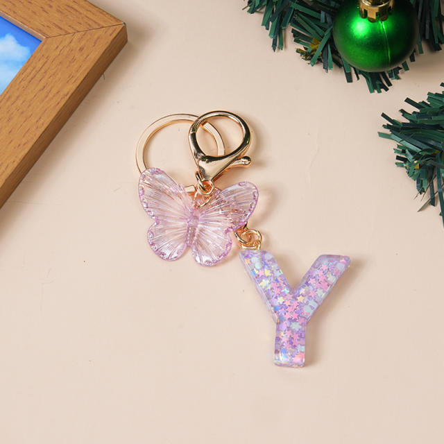 Purple color butterfly initial letter keychain