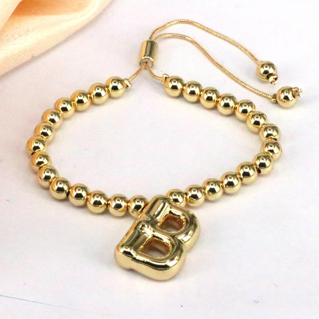 Chunky bubble initial letter charm gold plated copper beaded bracelet