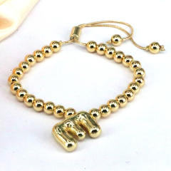 Chunky bubble initial letter charm gold plated copper beaded bracelet
