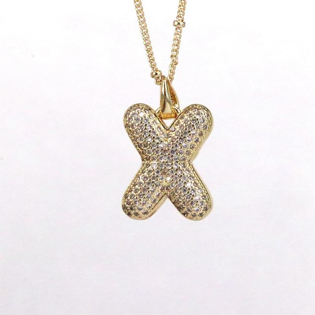 Delicate diamond bubble initial letter necklace