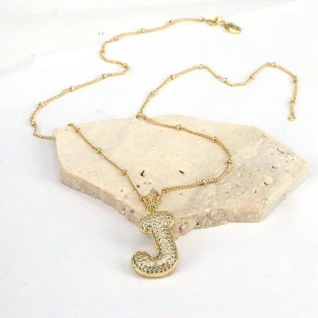 Delicate diamond bubble initial letter necklace