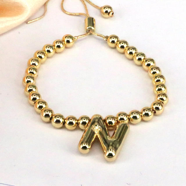 Chunky bubble initial letter charm gold plated copper beaded bracelet