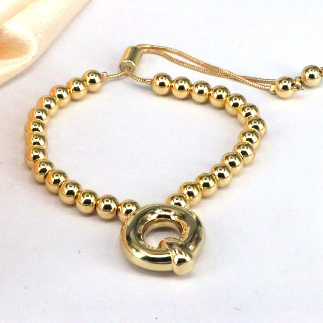 Chunky bubble initial letter charm gold plated copper beaded bracelet