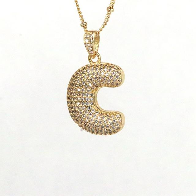 Delicate diamond bubble initial letter necklace