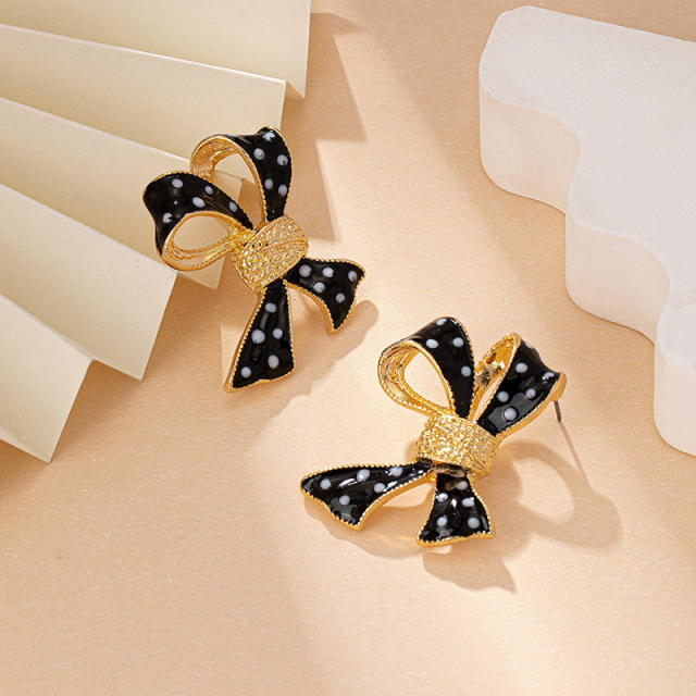 Sweet enamel polka dots bow alloy studs earrings