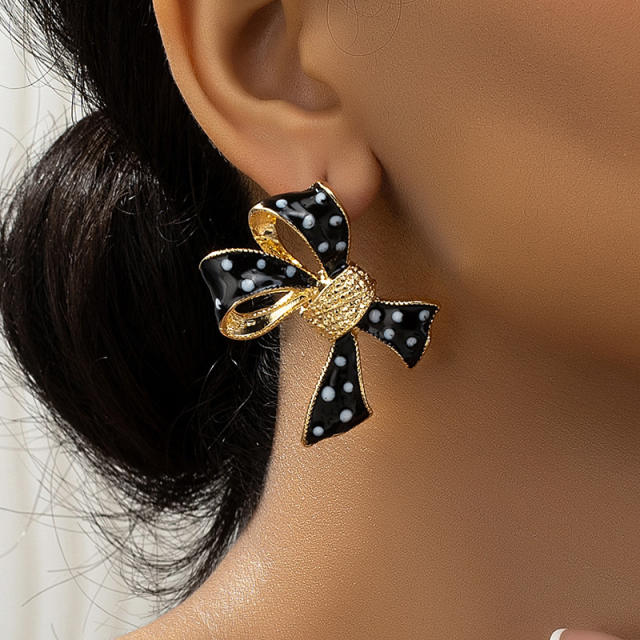 Sweet enamel polka dots bow alloy studs earrings