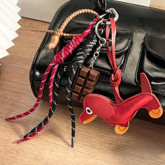 Vintage miu style leather sausage puppy woven rope chocolate bag pendant lanyard keychain
