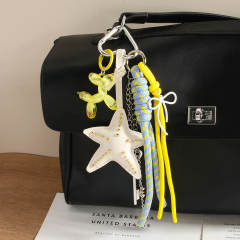 Net red personality starfish key tassel ball dog all-match pendant keychain woven rope bag pendant gift wholesale