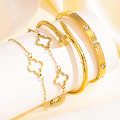 18KG classic hollow clover nail pattern stainless steel bracelet bangle