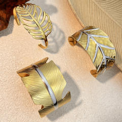Stainless steel bangle bracelet plated with 18K two tone leaf design bangle bracelet