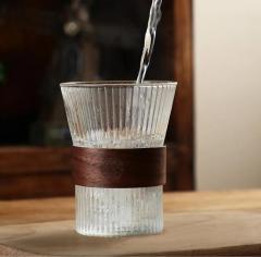 coffee cup with wooden hoop