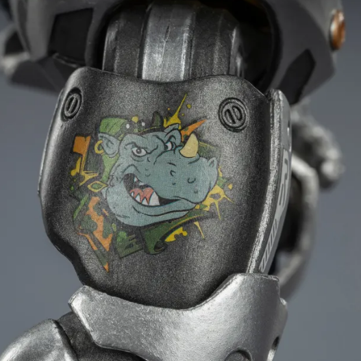 The Joytoy TMNT Mighty Rocksteady toy features a print of its own head image on the arm.