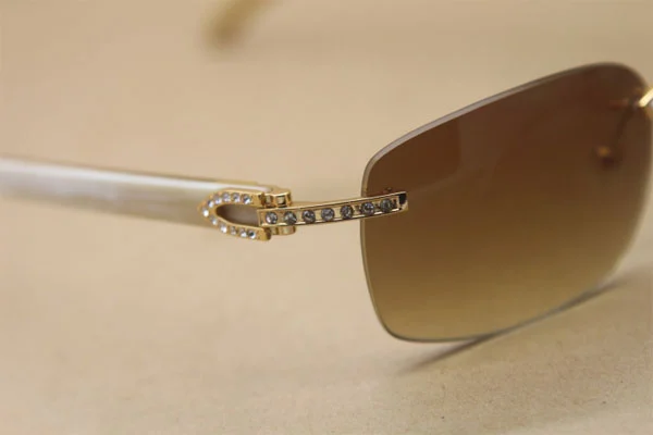 Cartier Rimless Smaller Big Stones T8200497 White Buffalo Horn Sunglasses in Gold Brown