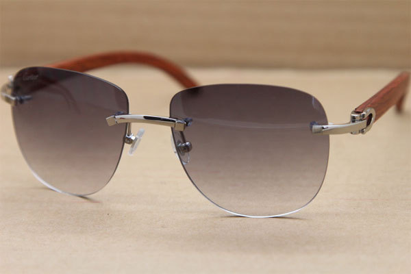 Cartier Rimless T8300680 Original Wood Sunglasses in Gold Brown Lens