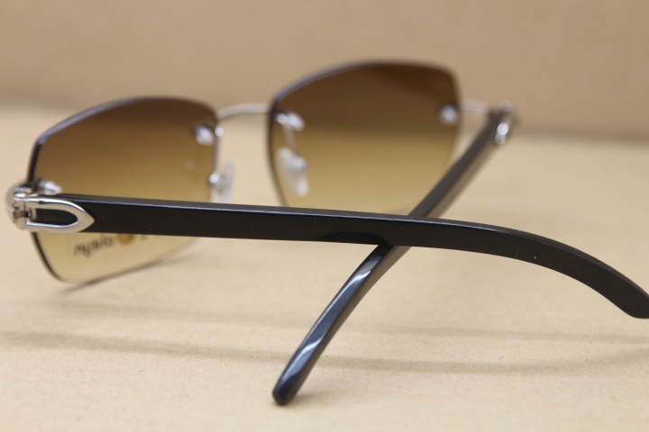 Cartier Rimless Sunglasses T8100905 Original Black Buffalo Horn Sunglasses in Gold Brown Lens