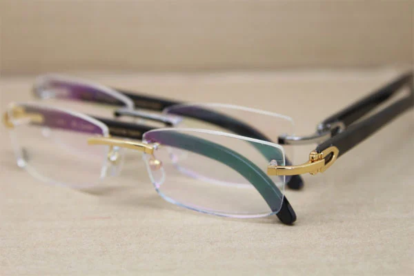 Cartier Rimless 3524012 Black Buffalo Horn Glasses in Gold