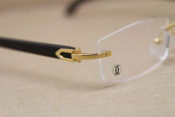 Cartier Rimless 3524012 Black Buffalo Horn Glasses in Gold