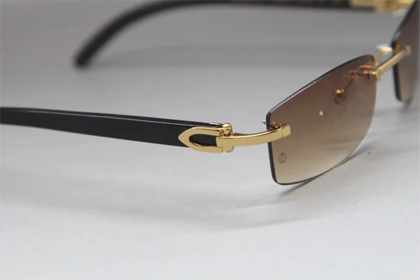 Cartier CT Black Buffalo Horn Rimless Sunglasses Gold Brown Lens Size：54