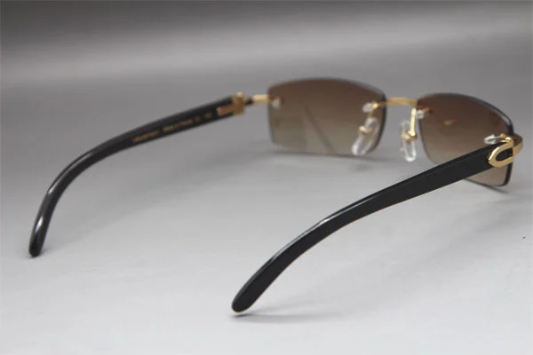 Cartier CT Black Buffalo Horn Rimless Sunglasses Gold Brown Lens Size：54