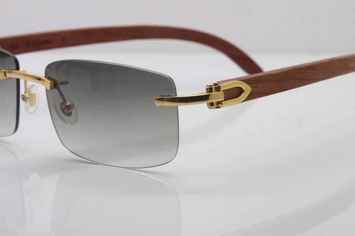 Wholesale High-end brand Cartier 3524012 Rimless Wood Sunglasses Carved Wood Trimming Lens in Gold Brown Lens Hot Size：56