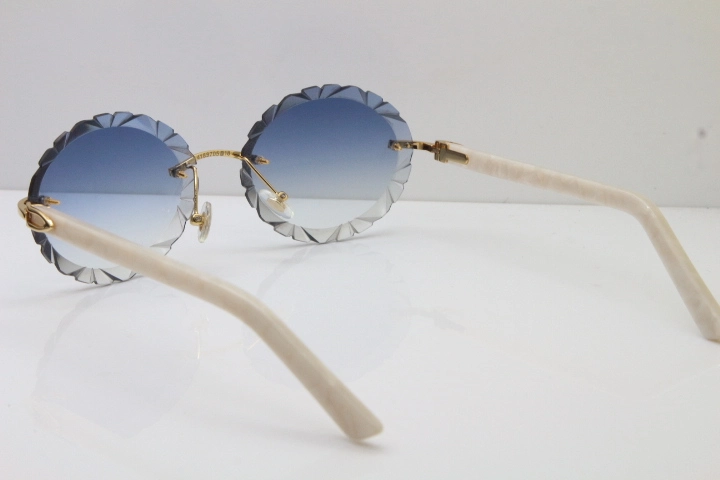 Cartier Rimless T8200761 Sunglasses In Gold Blue Carved Lens