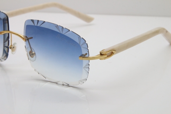 Cartier T8200762 Rimless Sunglasses In Gold Blue Carved Lens