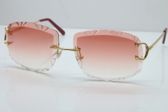 Cartier Rimless Metal Original T8200762 Sunglasses in Gold Pink Carved Lens