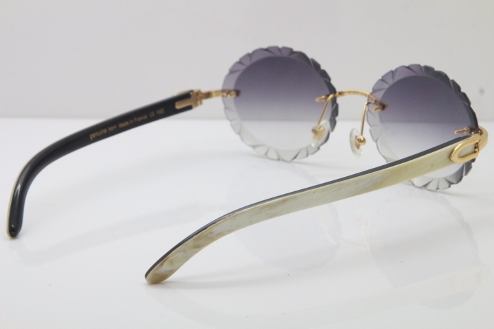 Cartier Rimless Original White Inside Black Buffalo Horn T8200761 Sunglasses in Gold Gray Carved Lens