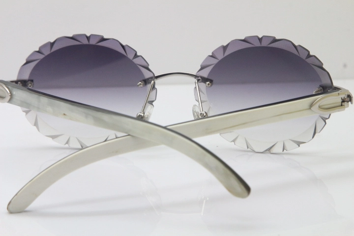 Cartier Rimless Original White Inside Black Buffalo Horn T8200761 Sunglasses in Gold Gray Carved Lens