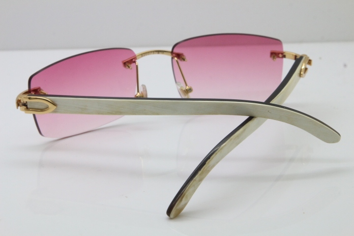 Cartier Rimless 8200757 SunGlasses Original White Inside Black Buffalo Horn Sunglasses in Gold Pink Lens