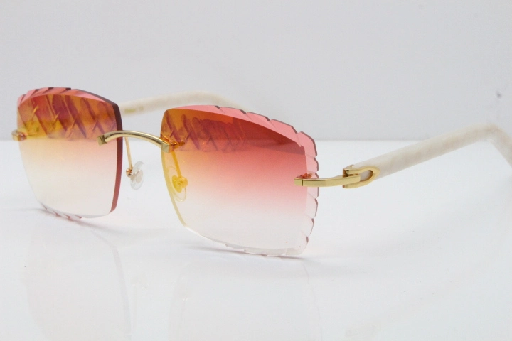 Cartier Rimless Aztec Arms 8300816 Carved Lens Sunglasses In Gold Red Mirror Lens