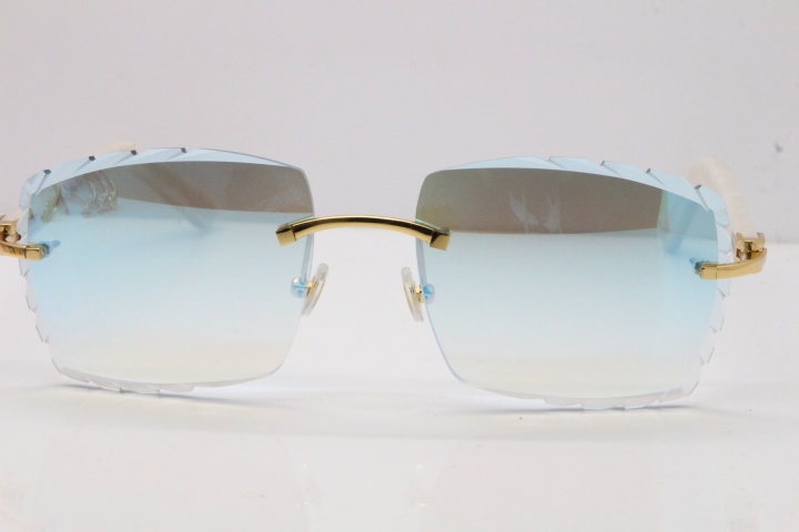 Cartier Rimless Aztec Arms 8300816 Carved Lens Sunglasses In Gold Ice Blue Lens