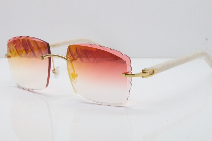 Cartier Rimless Aztec Arms 8300816 Carved Lens Sunglasses In Gold Red Mirror Lens