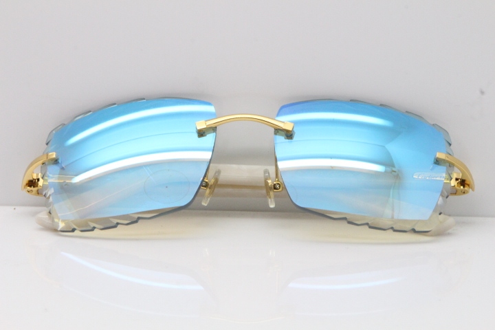 Cartier Rimless Aztec Arms 8300816 Carved Lens Sunglasses In Gold Ice Blue Lens