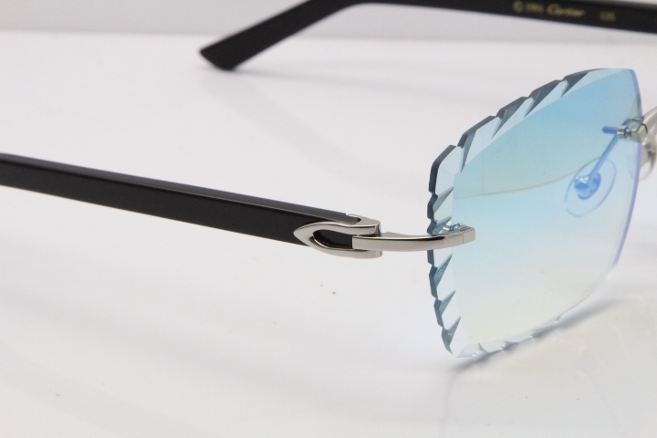 Cartier Rimless Aztec Arms 8300816 Carved Lens Sunglasses In Gold Ice Blue Lens