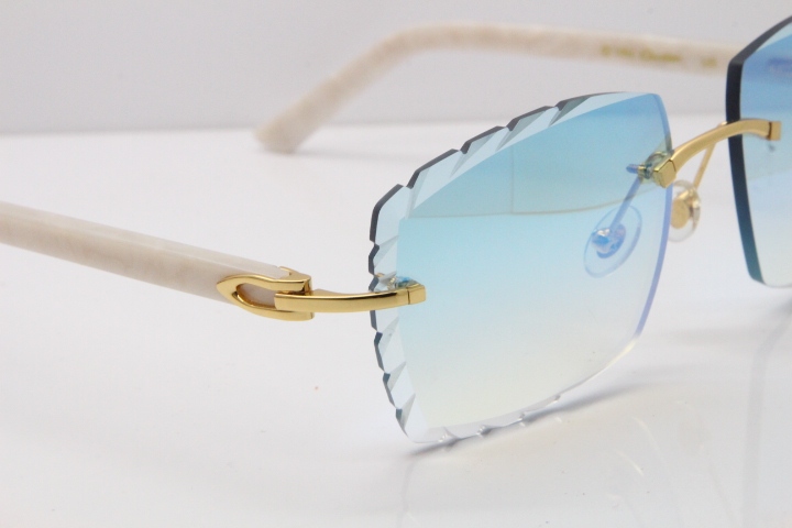 Cartier Rimless Aztec Arms 8300816 Carved Lens Sunglasses In Gold Ice Blue Lens