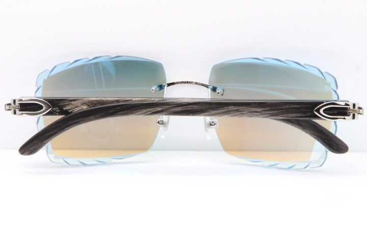 Cartier Rimless Original Black Flower Buffalo Horn 8300816 Sunglasses In Gold Ice Blue Carved Lens