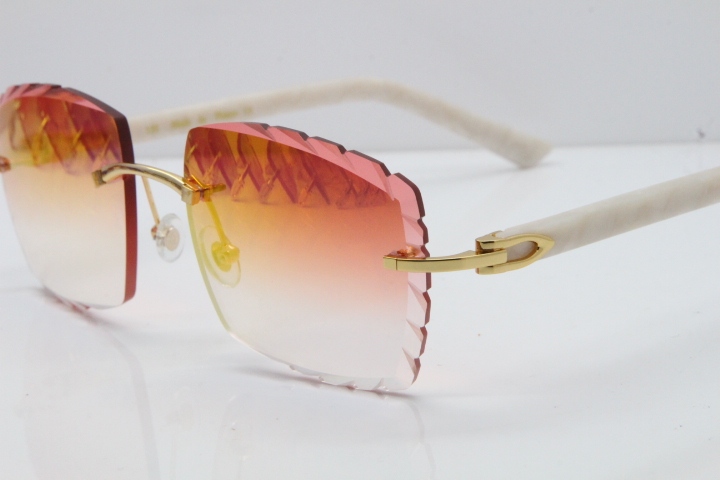 Cartier Rimless Aztec Arms 8300816 Carved Lens Sunglasses In Gold Red Mirror Lens